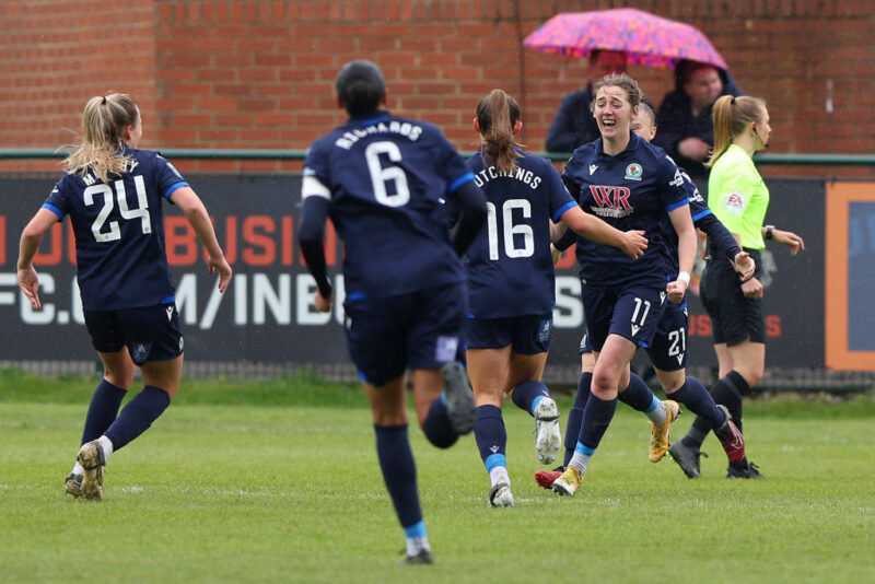 Meg Hornby of Blackburn Rovers celebrates with teammates after scoring the team's first goal during the Barclays FA Women's Championship match between Sunderland and Blackburn at Eppleton Colliery Welfare Ground.