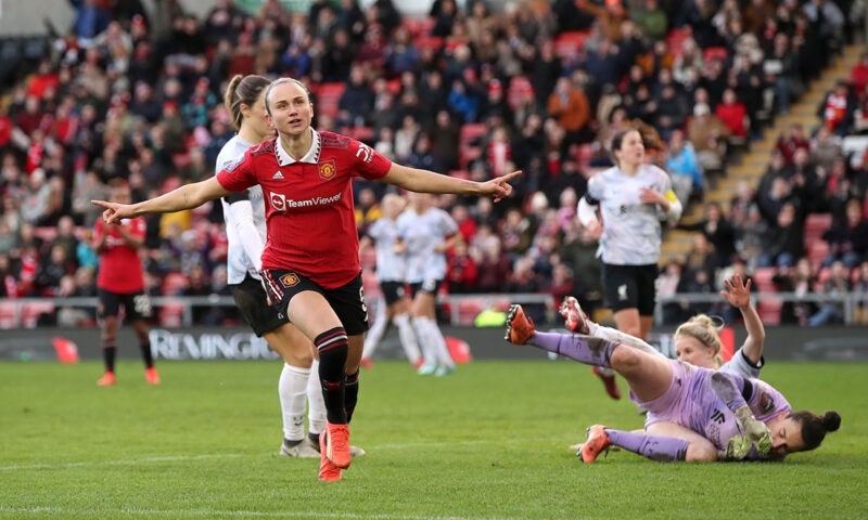 Martha Thomas celebrates her goal for Manchester United against Liverpool during the 2022-23 season